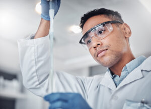 Man filling a test tube