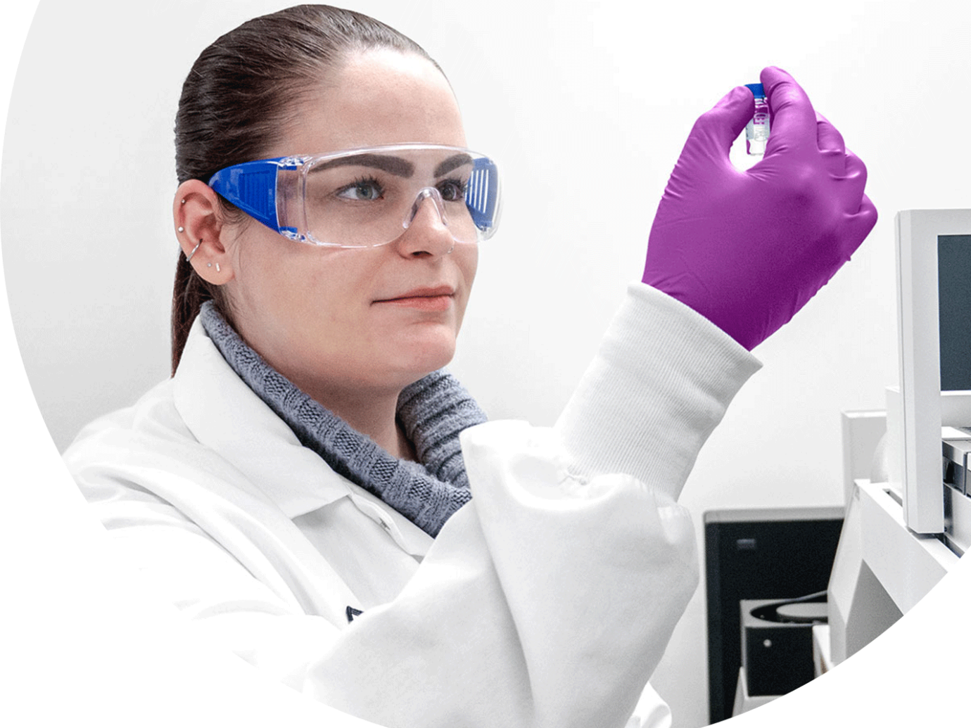 medical lab researcher in safety glasses